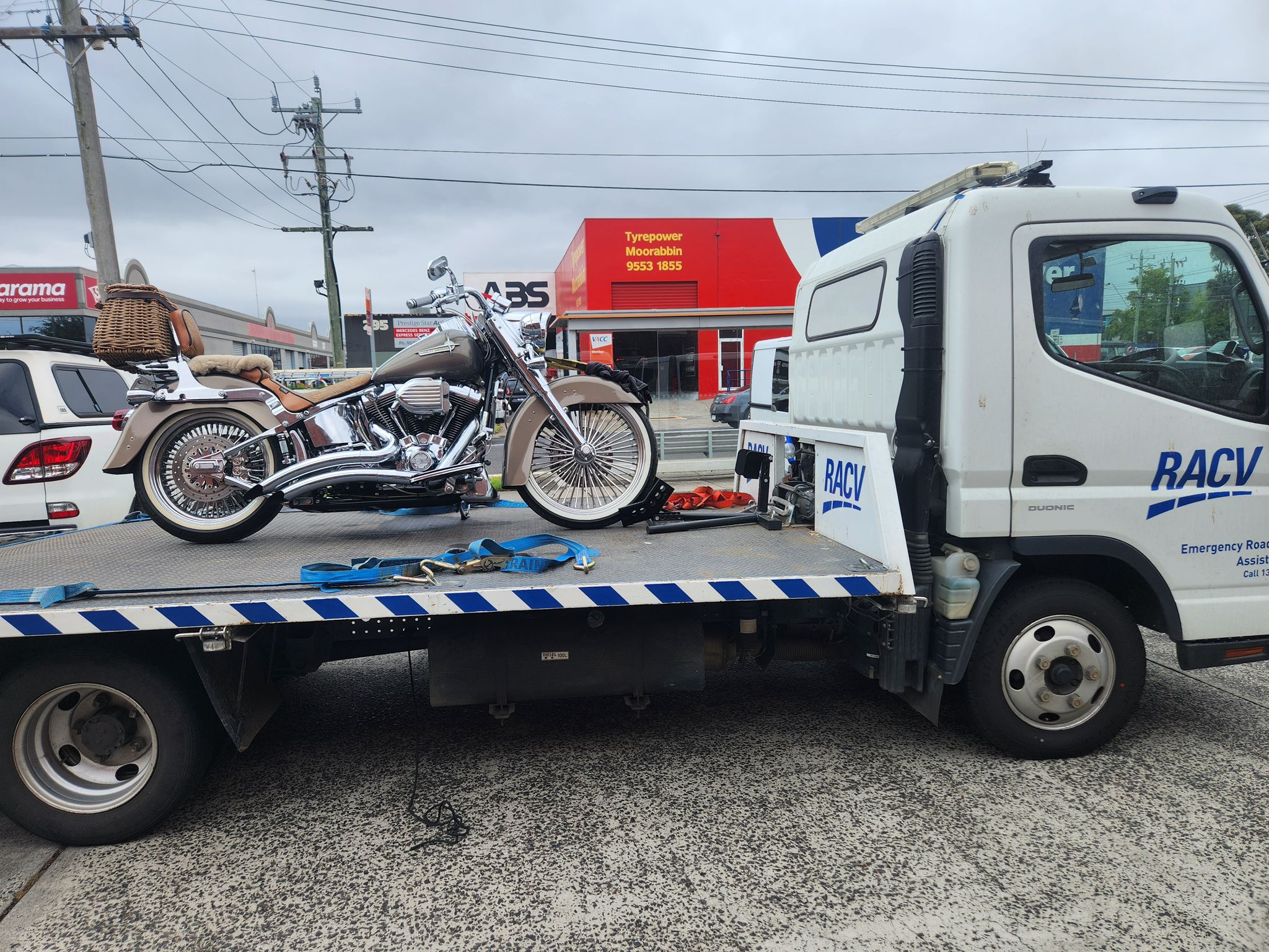 Harley-Davidson motorcycle transported on a recovery truck