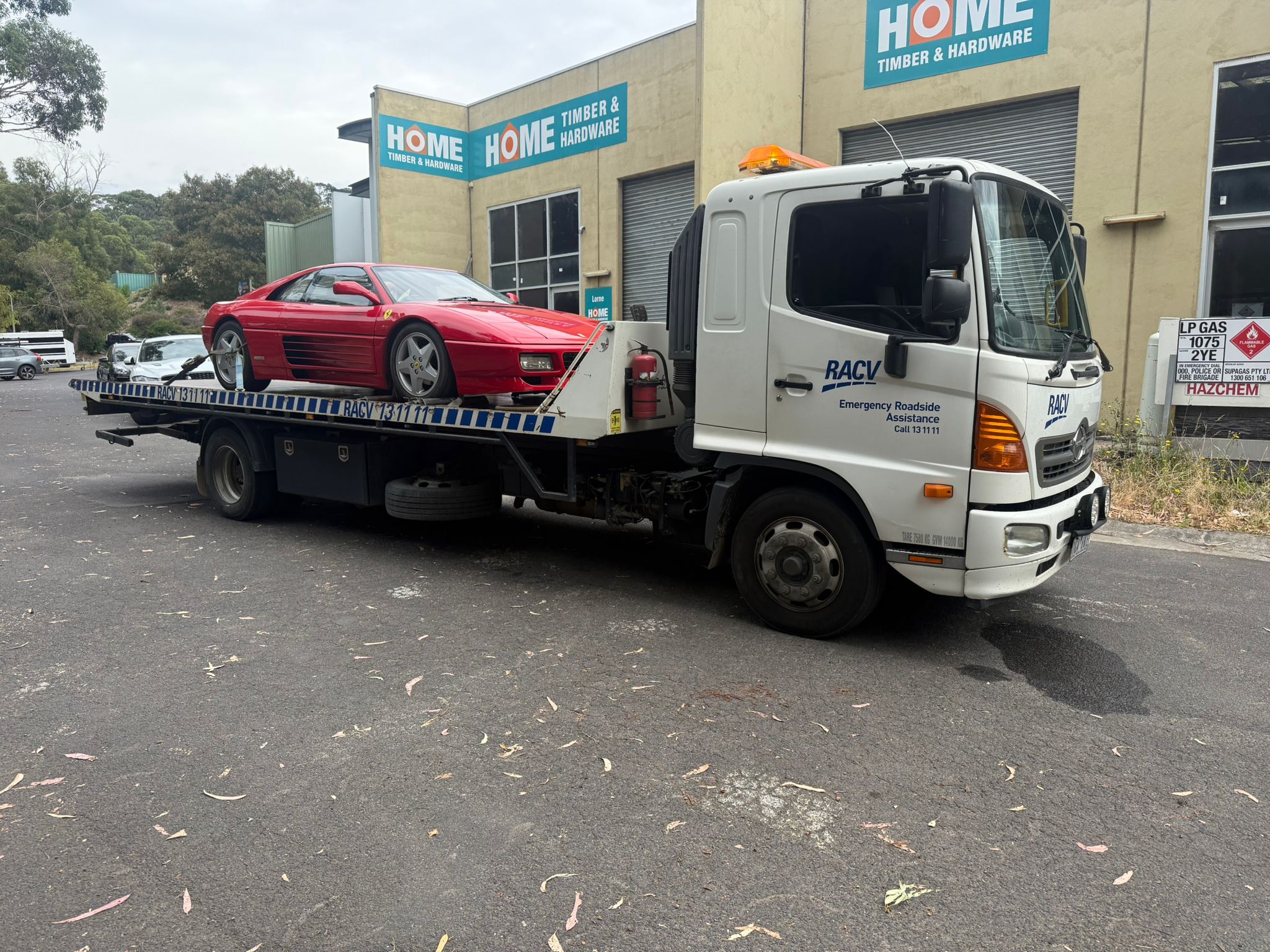 Ferrari 348 recovered onto a flatbed truck